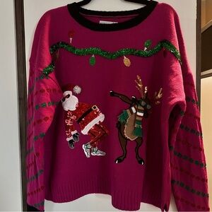Festive Pink Sweater with Santa and Reindeer